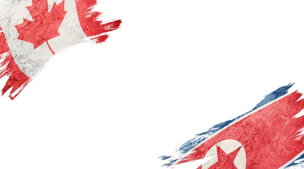 Bandeiras do Canadá e da Coreia do Norte em fundo branco — Fotografia de Stock